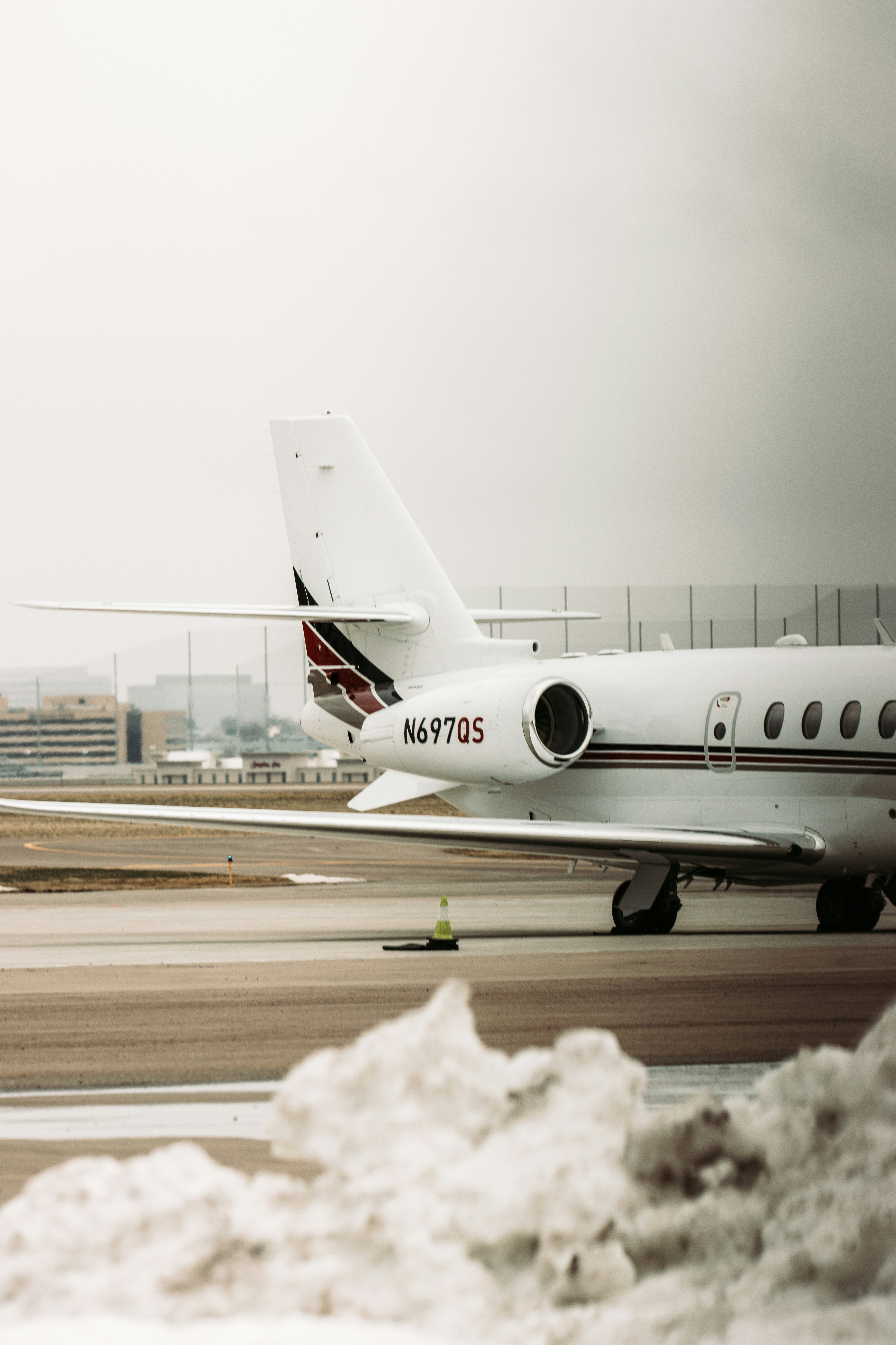 white passenger plane on airport during daytime